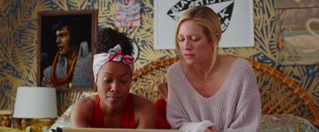 Movie still from “Someone Great” (2019), directed by Jennifer Kaytin Robinson – Two women sitting in front of a laptop computer; Medium shot, Over the shoulder angle