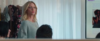 Movie still from “Someone Great” (2019), directed by Jennifer Kaytin Robinson – A woman standing in front of a mirror looking into the camera; Medium shot, Over the shoulder angle