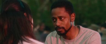 Movie still from “Someone Great” (2019), directed by Jennifer Kaytin Robinson – A person wearing a white shirt; Close Up shot, Over the shoulder angle