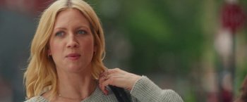 Movie still from “Someone Great” (2019), directed by Jennifer Kaytin Robinson – A person holding a purse; Close Up shot, Over the shoulder angle