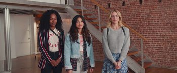 Movie still from “Someone Great” (2019), directed by Jennifer Kaytin Robinson – A group of women standing next to each other in a room; Medium shot, Low angle