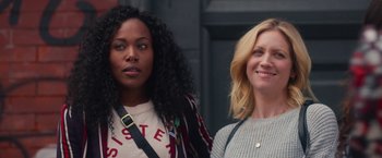 Movie still from “Someone Great” (2019), directed by Jennifer Kaytin Robinson – Two women standing next to each other on the street; Close Up shot, Over the shoulder angle