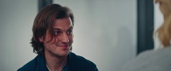 Movie still from “Someone Great” (2019), directed by Jennifer Kaytin Robinson – A person with long brown hair; Close Up shot, Over the shoulder angle