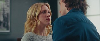 Movie still from “Someone Great” (2019), directed by Jennifer Kaytin Robinson – A woman with blonde hair looking at a man with blue eyes; Close Up shot, Over the shoulder angle