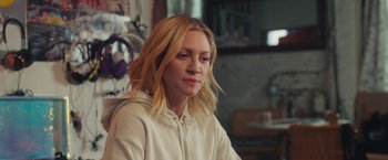 Movie still from “Someone Great” (2019), directed by Jennifer Kaytin Robinson – A woman sitting in front of a mirror in a room; Close Up shot, Over the shoulder angle