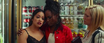 Movie still from “Someone Great” (2019), directed by Jennifer Kaytin Robinson – Two women are standing next to each other in a store; Close Up shot, Over the shoulder angle
