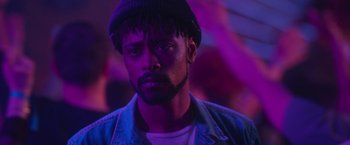 Movie still from “Someone Great” (2019), directed by Jennifer Kaytin Robinson – A person wearing a hat; Close Up shot, Over the shoulder angle