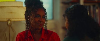Movie still from “Someone Great” (2019), directed by Jennifer Kaytin Robinson – A woman in a red shirt talking to another woman; Close Up shot, Over the shoulder angle