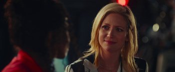 Movie still from “Someone Great” (2019), directed by Jennifer Kaytin Robinson – A woman with blonde hair is looking at the camera; Close Up shot, Over the shoulder angle