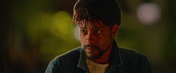 Movie still from “Someone Great” (2019), directed by Jennifer Kaytin Robinson – A person wearing a hat; Close Up shot, Over the shoulder angle