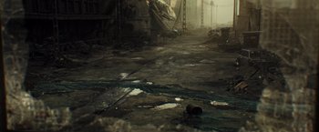 Movie still from “Spectral” (2016), directed by Nic Mathieu – A very dirty looking area with a rat on the ground; Extreme Wide shot, High angle