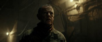 Movie still from “Spectral” (2016), directed by Nic Mathieu – An older man in a military uniform looking into the distance; Close Up shot, Low angle