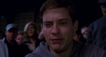 Movie still from “Spider-Man” (2002), directed by Sam Raimi – A person with his eyes wide open; Close Up shot, Low angle