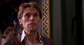 Movie still from “Spider-Man” (2002), directed by Sam Raimi – A person looking at the camera; Close Up shot, Low angle