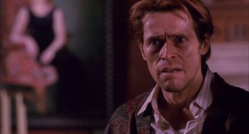 Movie still from “Spider-Man” (2002), directed by Sam Raimi – Willem dafoe in a movie scene; Close Up shot, Over the shoulder angle
