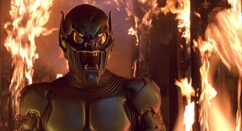 Movie still from “Spider-Man” (2002), directed by Sam Raimi – The face of an evil looking robot; Close Up shot, Low angle