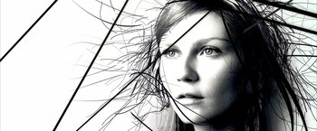 Movie still from “Spider-Man 2” (2004), directed by Sam Raimi – A black and white photo of a woman's face; Extreme Close Up shot, Overhead angle