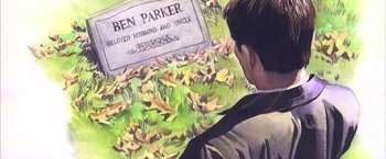 Movie still from “Spider-Man 2” (2004), directed by Sam Raimi – A man standing next to a bunch of green leaves; Extreme Close Up shot, High angle