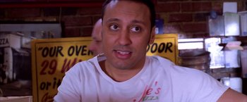 A person wearing a white t - shirt