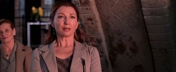 Movie still from “Spider-Man 2” (2004), directed by Sam Raimi – A person wearing a jacket; Close Up shot, Low angle