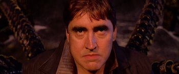 Movie still from “Spider-Man 2” (2004), directed by Sam Raimi – A person wearing a jacket; Close Up shot, Low angle