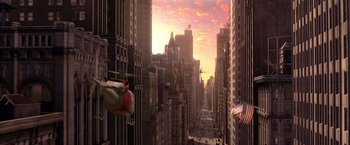 Movie still from “Spider-Man 2” (2004), directed by Sam Raimi – An aerial view of a city with a sky filled with lots of buildings; Extreme Wide shot, High angle