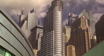 Movie still from “Starship Troopers” (1997), directed by Paul Verhoeven – A very tall skyscraper in the middle of a city; Extreme Wide shot, Low angle