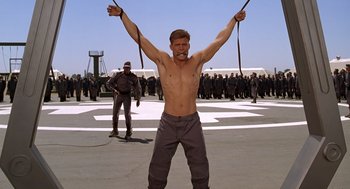 Movie still from “Starship Troopers” (1997), directed by Paul Verhoeven – Medium shot, Low angle