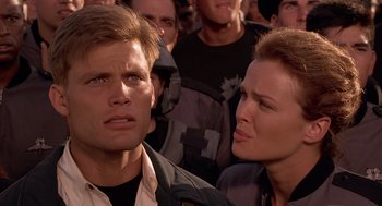 Movie still from “Starship Troopers” (1997), directed by Paul Verhoeven – Close Up shot, Over the shoulder angle