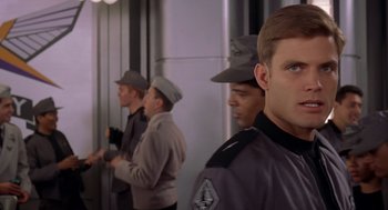 Movie still from “Starship Troopers” (1997), directed by Paul Verhoeven – Close Up shot, Over the shoulder angle