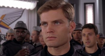 Movie still from “Starship Troopers” (1997), directed by Paul Verhoeven – Close Up shot, Over the shoulder angle