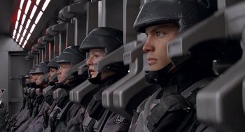 Movie still from “Starship Troopers” (1997), directed by Paul Verhoeven – Close Up shot, Low angle