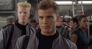 Movie still from “Starship Troopers” (1997), directed by Paul Verhoeven – Close Up shot, Over the shoulder angle