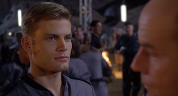 Movie still from “Starship Troopers” (1997), directed by Paul Verhoeven – Close Up shot, Over the shoulder angle