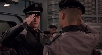 Movie still from “Starship Troopers” (1997), directed by Paul Verhoeven – Medium shot, Low angle