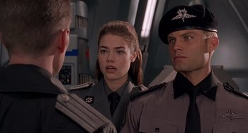 Movie still from “Starship Troopers” (1997), directed by Paul Verhoeven – Close Up shot, Over the shoulder angle