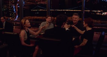 Movie still from “Still Alice” (2014), directed by Richard Glatzer – A group of people sitting at a table drinking wine; Medium shot, High angle