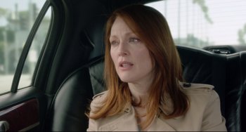 Movie still from “Still Alice” (2014), directed by Richard Glatzer – A person sitting in a car; Close Up shot, Over the shoulder angle