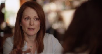 Movie still from “Still Alice” (2014), directed by Richard Glatzer – A person sitting in front of another person; Close Up shot, Over the shoulder angle
