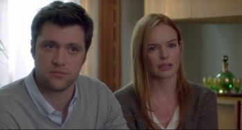 Movie still from “Still Alice” (2014), directed by Richard Glatzer – A man and a woman sitting next to each other in a room; Close Up shot, Over the shoulder angle