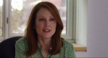 Movie still from “Still Alice” (2014), directed by Richard Glatzer – Julianne moore in a green polka dot shirt; Close Up shot, Over the shoulder angle