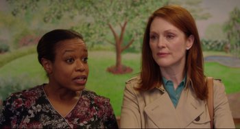Movie still from “Still Alice” (2014), directed by Richard Glatzer – Two women standing next to each other in front of a painting; Close Up shot, Over the shoulder angle