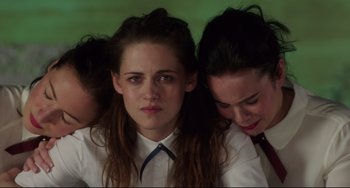 Movie still from “Still Alice” (2014), directed by Richard Glatzer – A person sitting next to two other people; Close Up shot, High angle