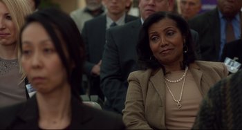 Movie still from “Still Alice” (2014), directed by Richard Glatzer – A group of people sitting in a room; Close Up shot, Over the shoulder angle