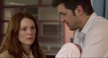 Movie still from “Still Alice” (2014), directed by Richard Glatzer – A man and a woman talking to each other; Close Up shot, Over the shoulder angle