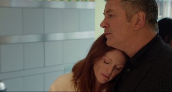 Movie still from “Still Alice” (2014), directed by Richard Glatzer – A man and a woman embracing each other in a room; Close Up shot, Low angle