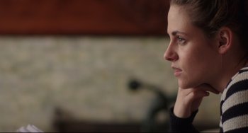 Movie still from “Still Alice” (2014), directed by Richard Glatzer – A person with a hand on her chin; Close Up shot, Over the shoulder angle