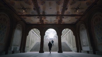Movie still from “Mr. Robot” (2015), created by Sam Esmail – Two people are walking down the steps of a building; Extreme Wide shot, Low angle