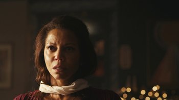 Movie still from “Mr. Robot” (2015), created by Sam Esmail – A person wearing a neck scarf; Close Up shot, Over the shoulder angle