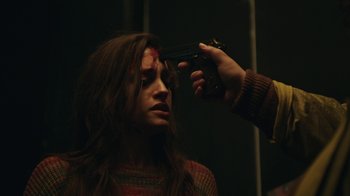 Movie still from “Mr. Robot” (2015), created by Sam Esmail – A woman getting her hair cut by a stylist; Close Up shot, Over the shoulder angle